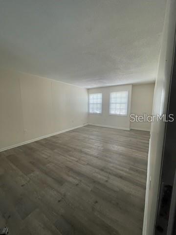 2783 L B McLeod Road, Unit D Orlando, FL 32805 - Photo 4 of 12 an empty room with windows