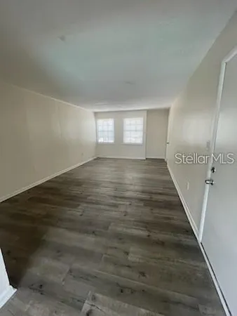 a view of an empty room and window