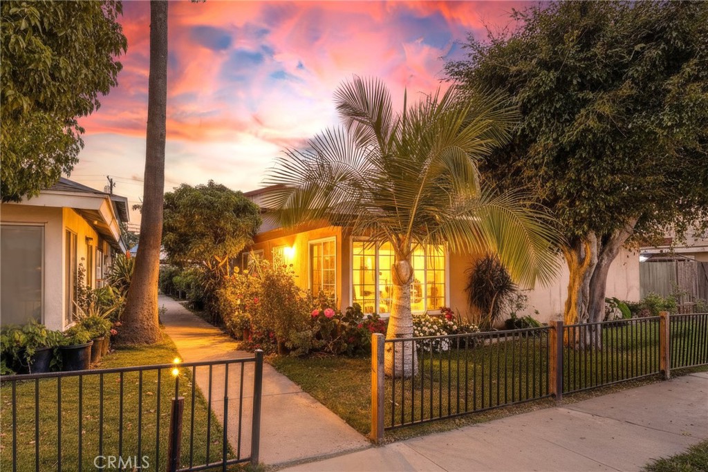 1813 Cedar Street Santa Ana, CA 92707 - Photo 6 of 6 a view of a pathway with a wrought fence