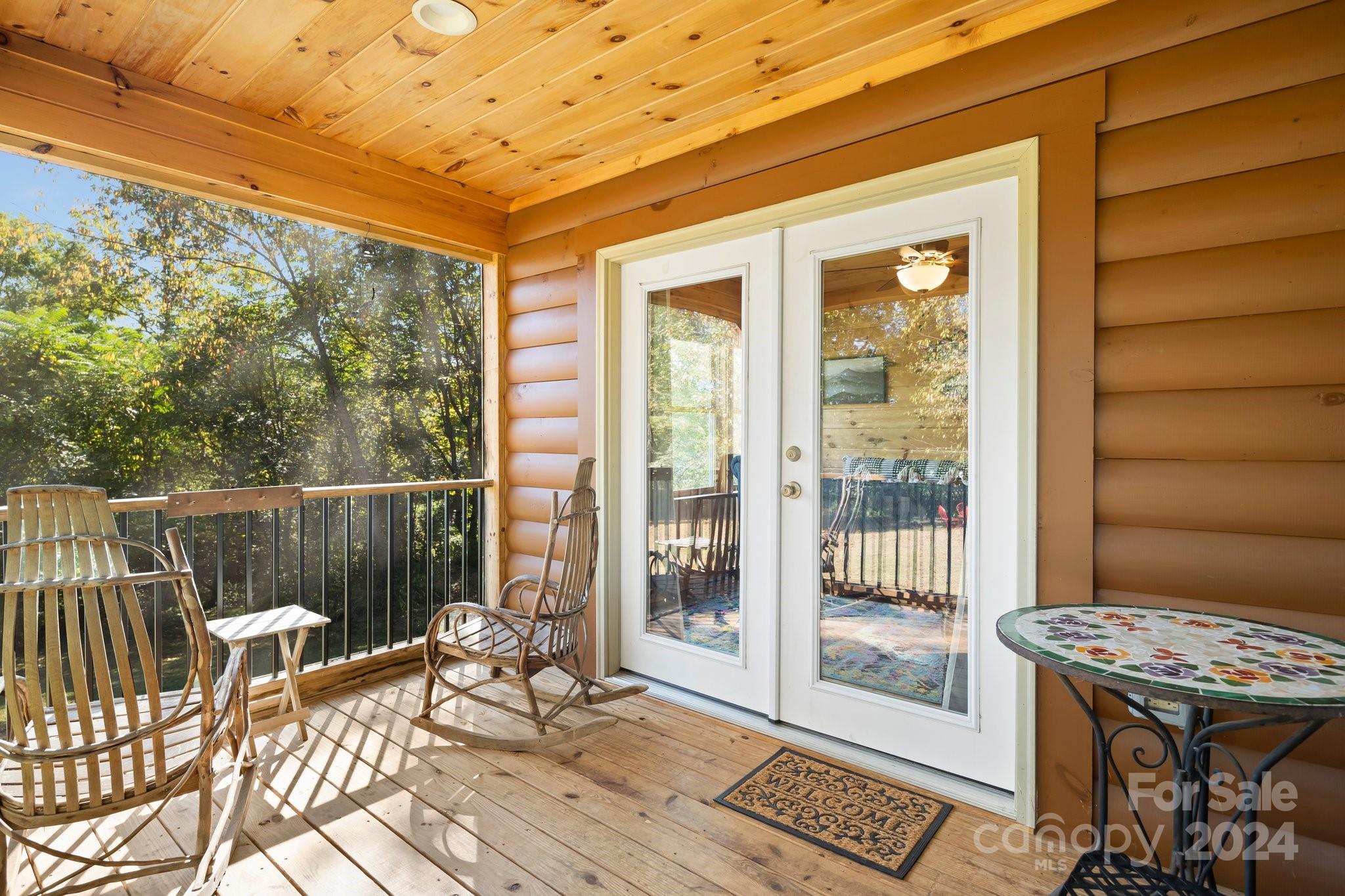 64 Bennett Road Candler, NC 28715 - Photo 20 of 24 a view of a balcony with wooden floor