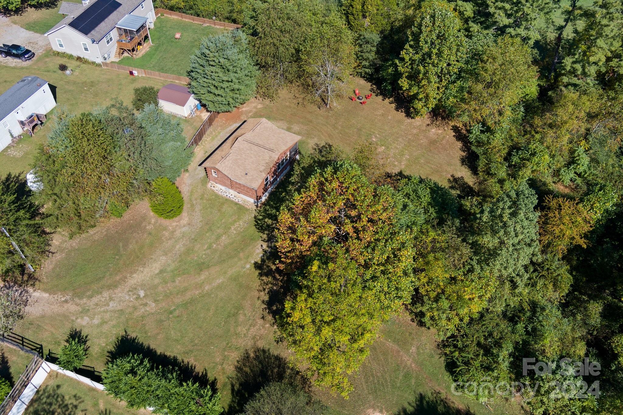 64 Bennett Road Candler, NC 28715 - Photo 2 of 24 an aerial view of residential house with outdoor space