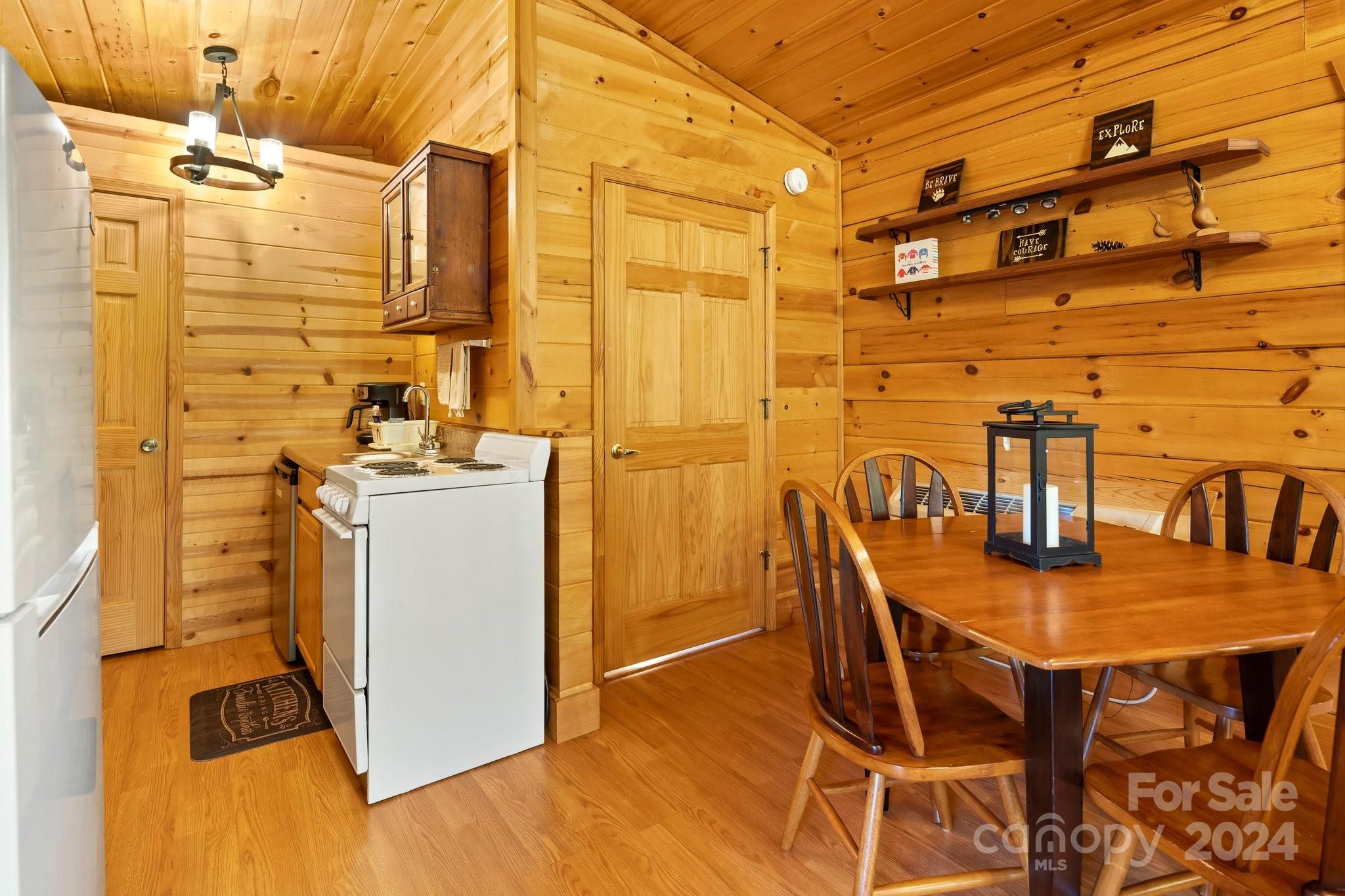 64 Bennett Road Candler, NC 28715 - Photo 9 of 24 a view of a dining room with furniture