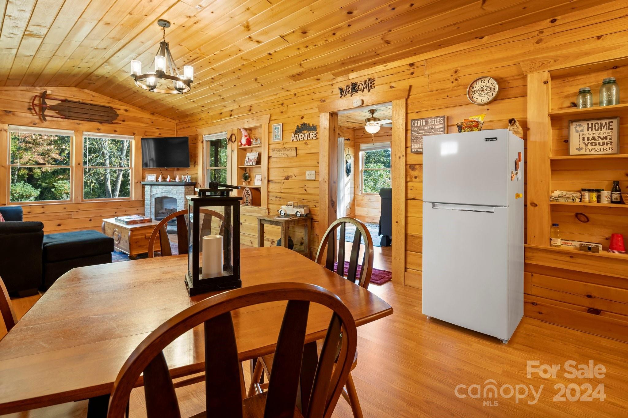 64 Bennett Road Candler, NC 28715 - Photo 10 of 24 a view of a dining room with furniture window and outside view