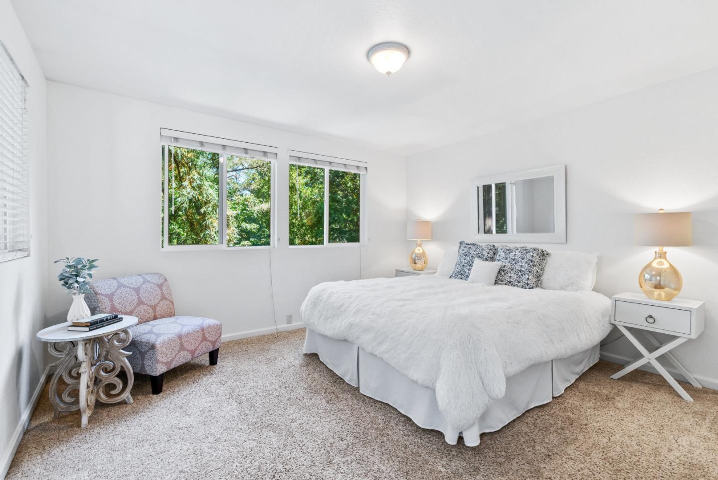 115 Shadowbrook Road Ben Lomond, CA 95005 - Photo 11 of 51 a bedroom with a bed and a table