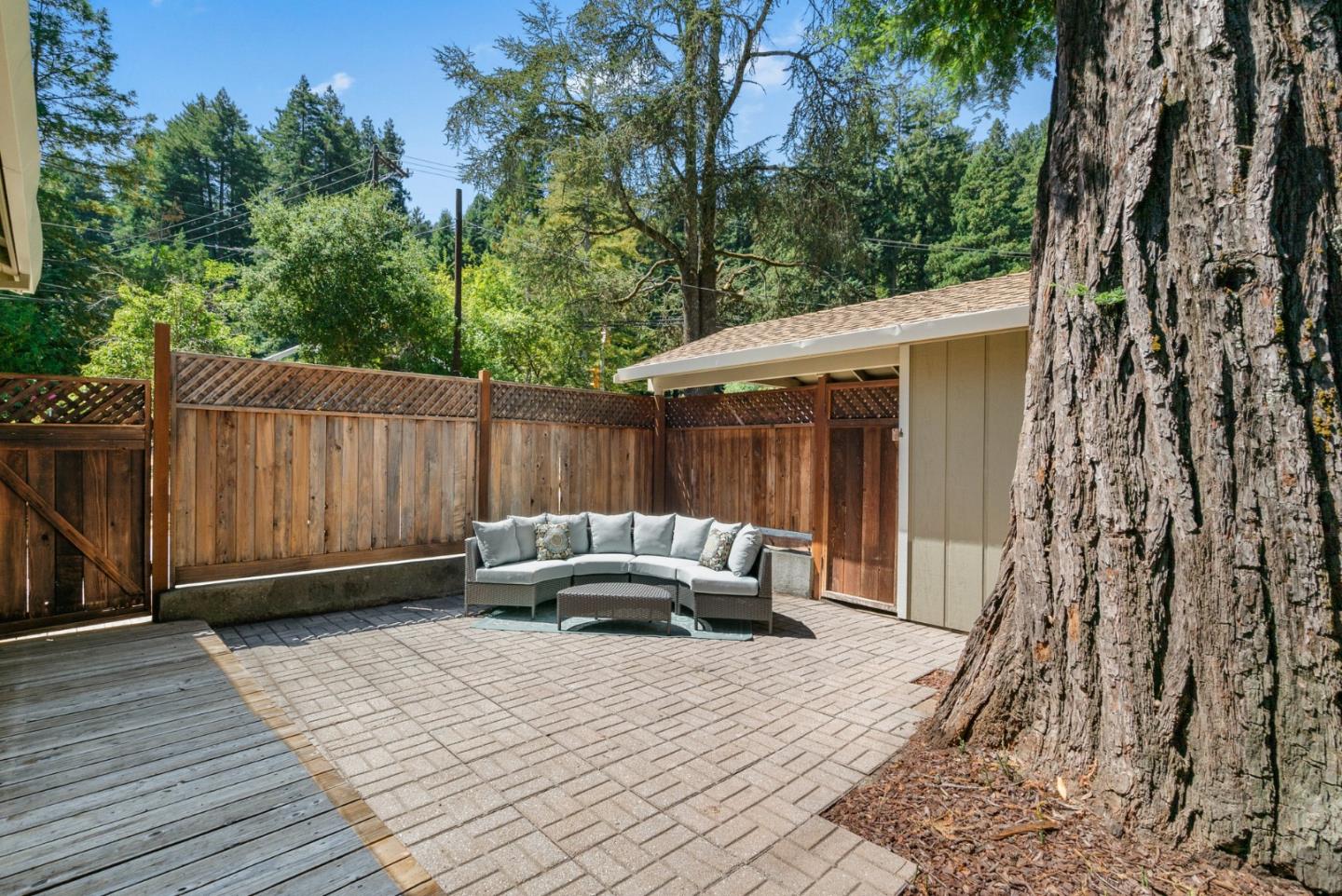 115 Shadowbrook Road Ben Lomond, CA 95005 - Photo 19 of 51 a backyard of a house with yard and outdoor seating