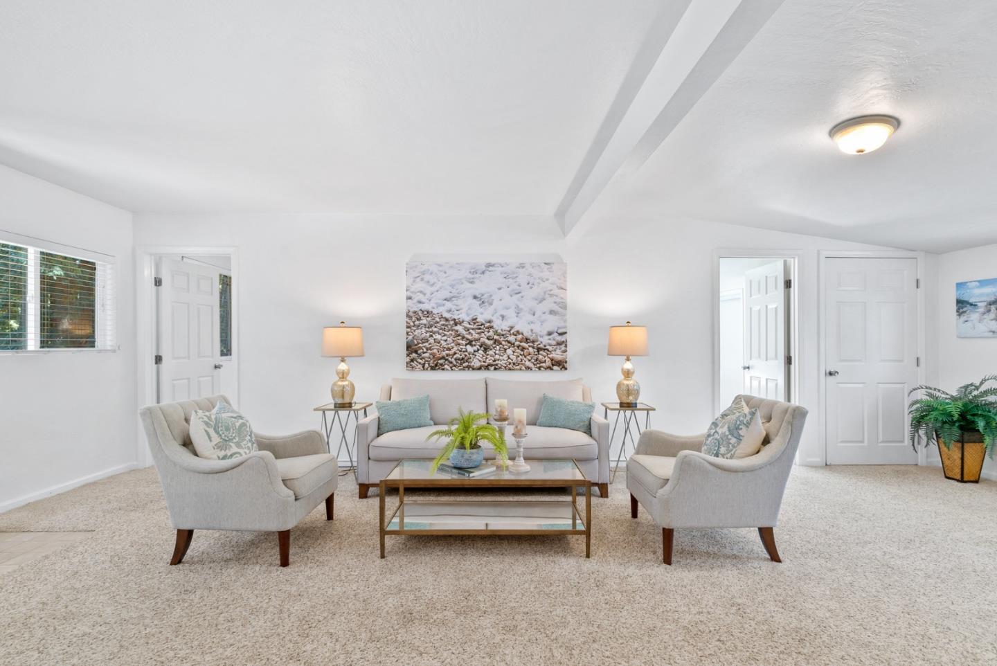 115 Shadowbrook Road Ben Lomond, CA 95005 - Photo 2 of 51 a living room with furniture and a potted plant