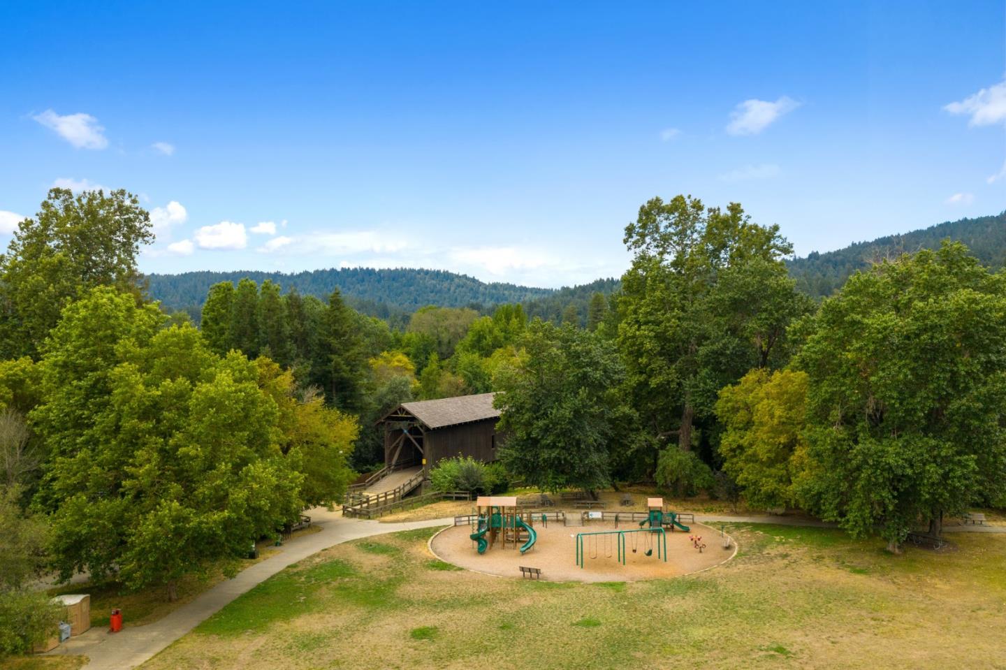 115 Shadowbrook Road Ben Lomond, CA 95005 - Photo 50 of 51 a backyard of a house with table and chairs
