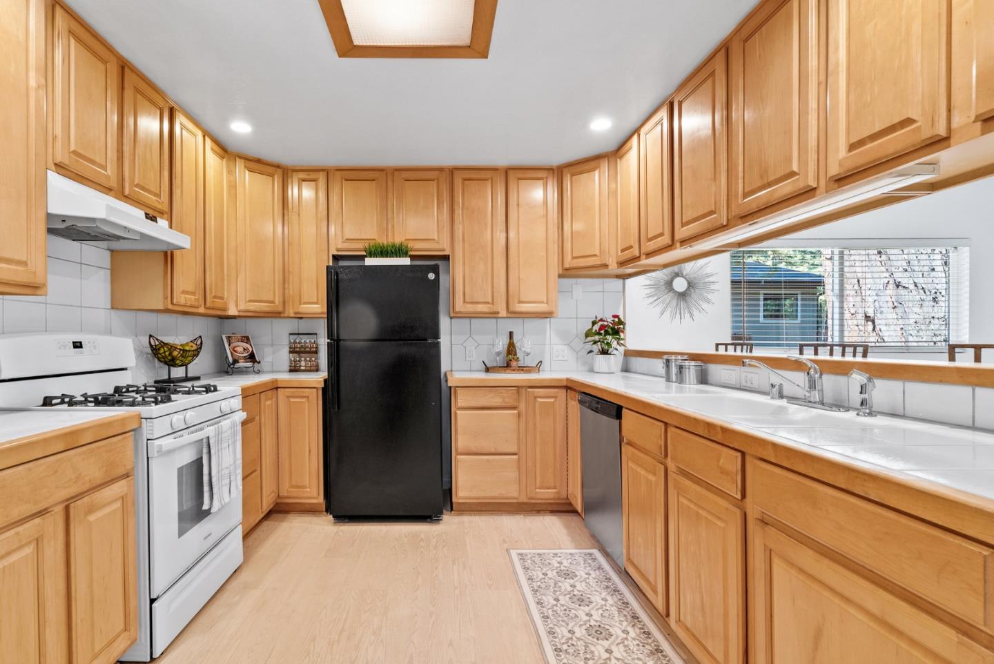 115 Shadowbrook Road Ben Lomond, CA 95005 - Photo 8 of 51 a kitchen with a refrigerator stove top oven and sink