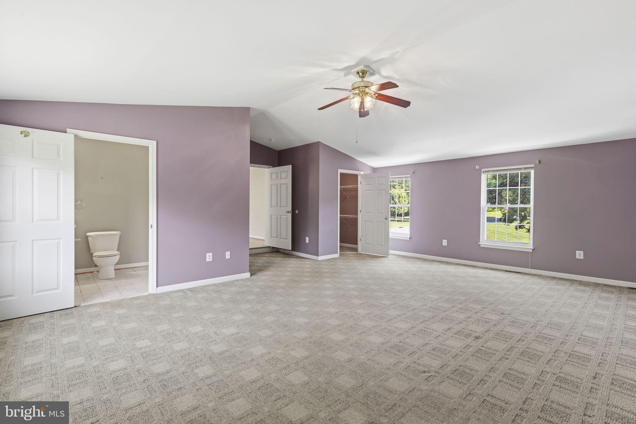 3906 Boxwood Road Jarrettsville, MD 21084 - Photo 19 of 36 Spacious room with soft purple hues.