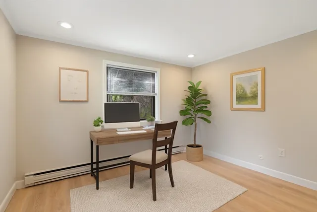 a workspace with furniture and window