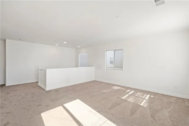 an empty room with an empty room