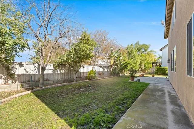 a house view with garden space