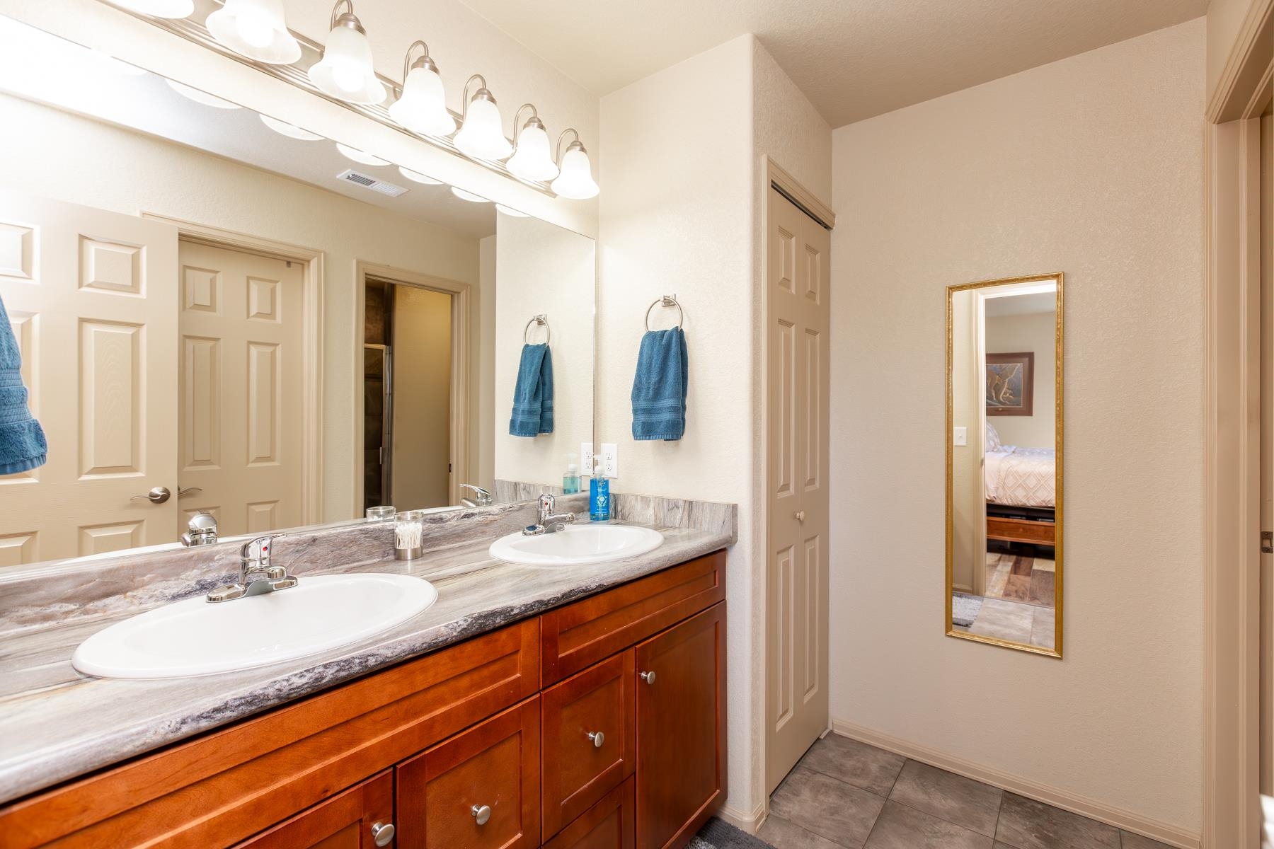 103 Red Rocks Street Fruita, CO 81521 - Photo 36 of 39 a bathroom with a sink double vanity and a mirror