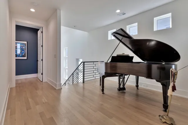 a living room with furniture and a chair