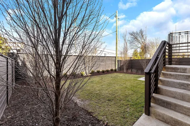 a view of backyard with green space