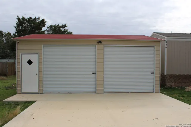 a view of backyard and tree