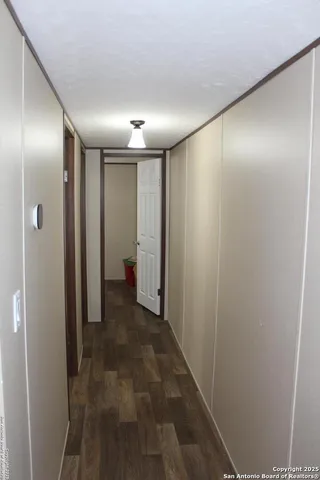 a bathroom with a shower curtain and a curtain