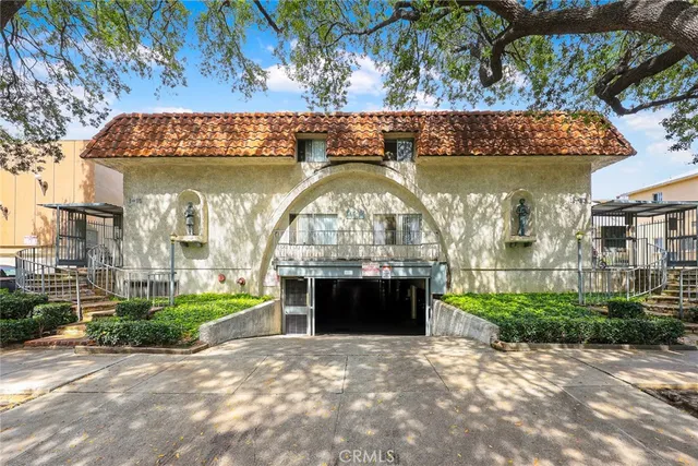 a view of swimming pool with a outdoor seating and a garden