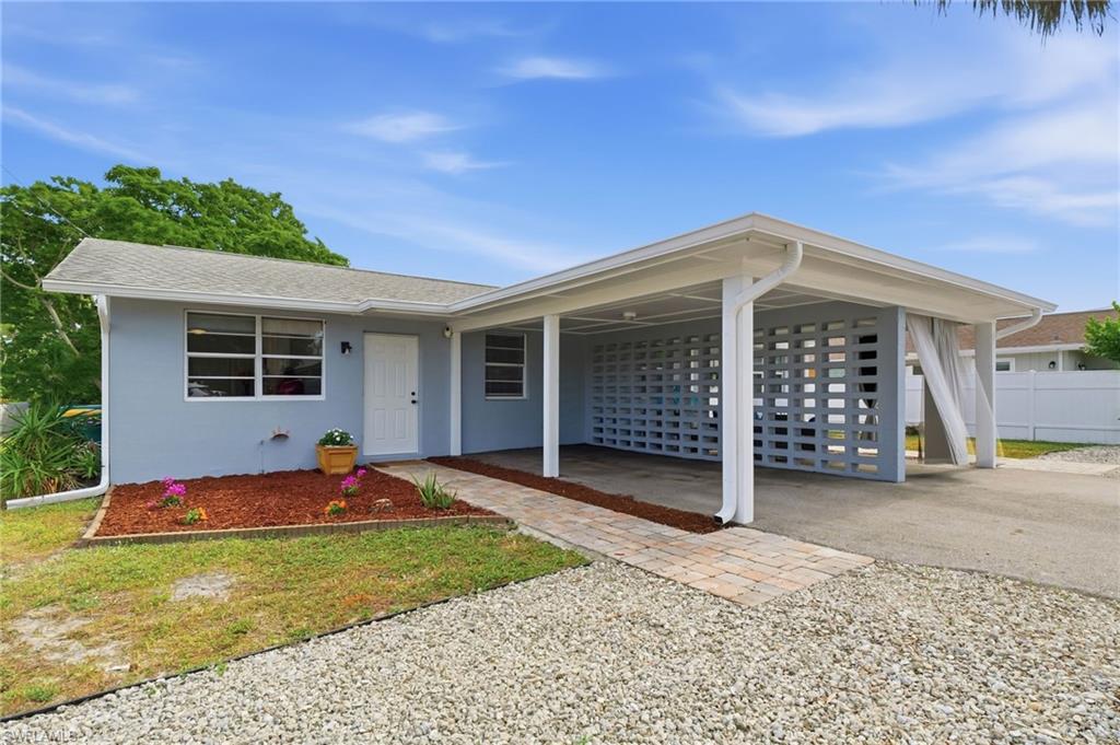 a front view of a house with a porch