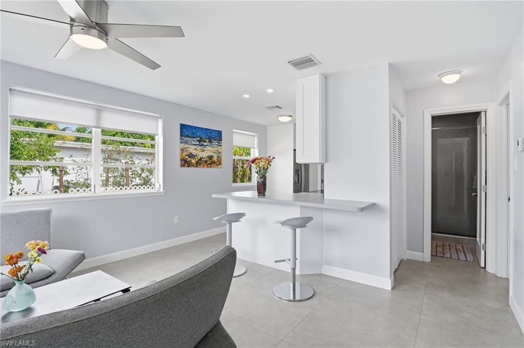 4518 West Alhambra Circle Naples, FL 34103 - Photo 12 of 40 a view of workspace with a window