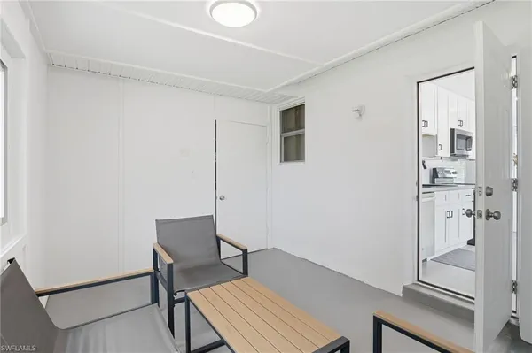 a workspace room with a hardwood
