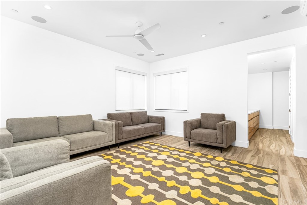 237 1st Street Huntington Beach, CA 92648 - Photo 16 of 68 a living room with furniture and kitchen view