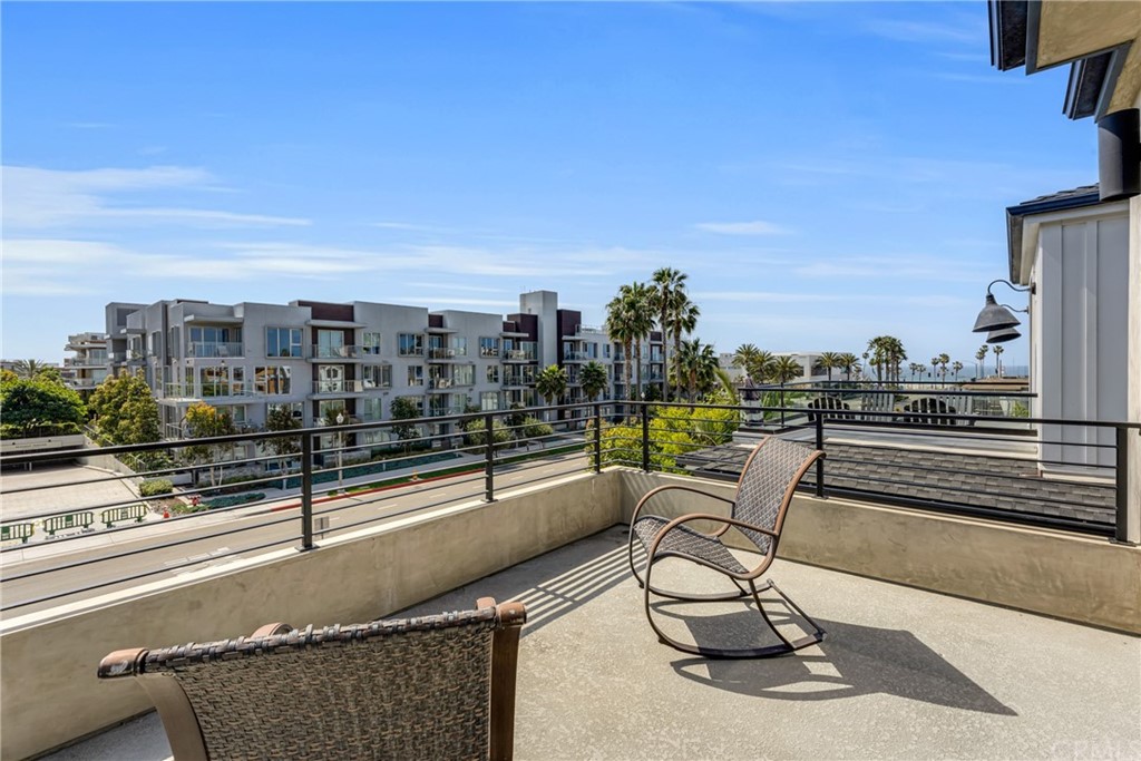 237 1st Street Huntington Beach, CA 92648 - Photo 37 of 68 a view of a terrace with seating space