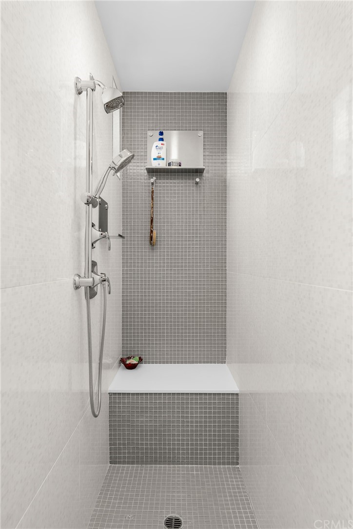 237 1st Street Huntington Beach, CA 92648 - Photo 40 of 68 a bathroom with a shower