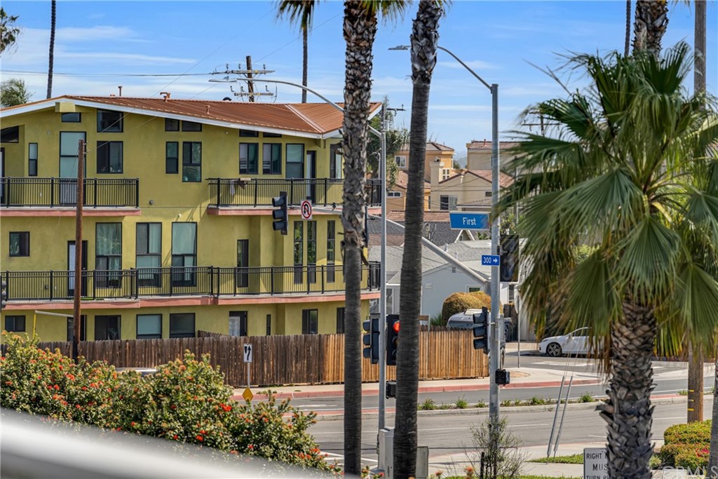 237 1st Street Huntington Beach, CA 92648 - Photo 51 of 68 a front view of a multi story residential apartment building