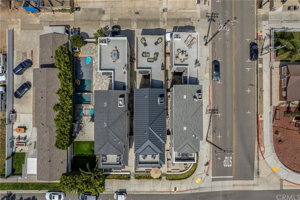 237 1st Street Huntington Beach, CA 92648 - Photo 59 of 68 an aerial view of residential houses with outdoor space and street view