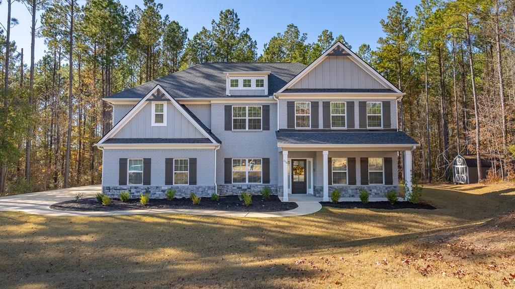 274 James Creek Road Fortson, GA 31808 - Photo 1 of 59 a front view of a house with a yard