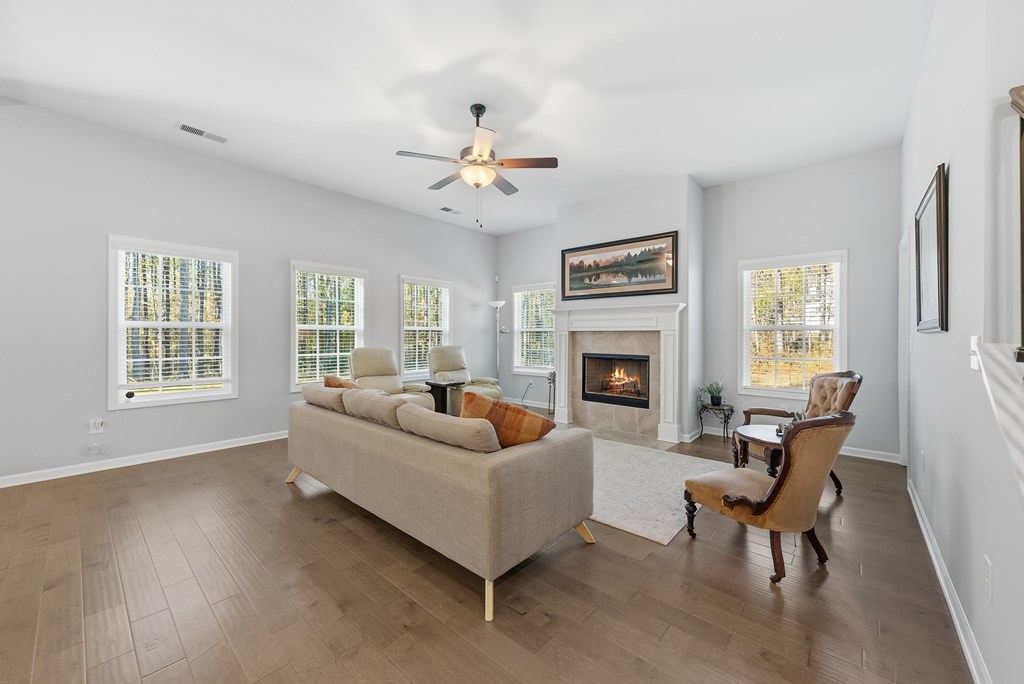 274 James Creek Road Fortson, GA 31808 - Photo 13 of 59 a living room with furniture and a fireplace