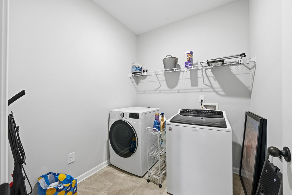 274 James Creek Road Fortson, GA 31808 - Photo 23 of 59 a utility room with dryer and washer