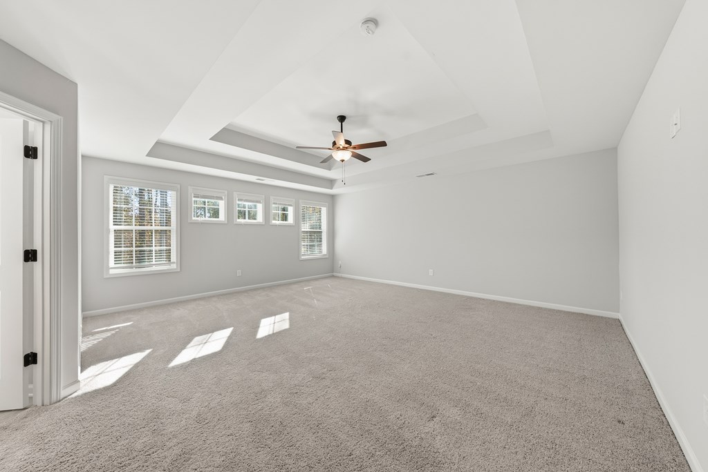 274 James Creek Road Fortson, GA 31808 - Photo 25 of 59 a view of a big room with windows and chandelier fan
