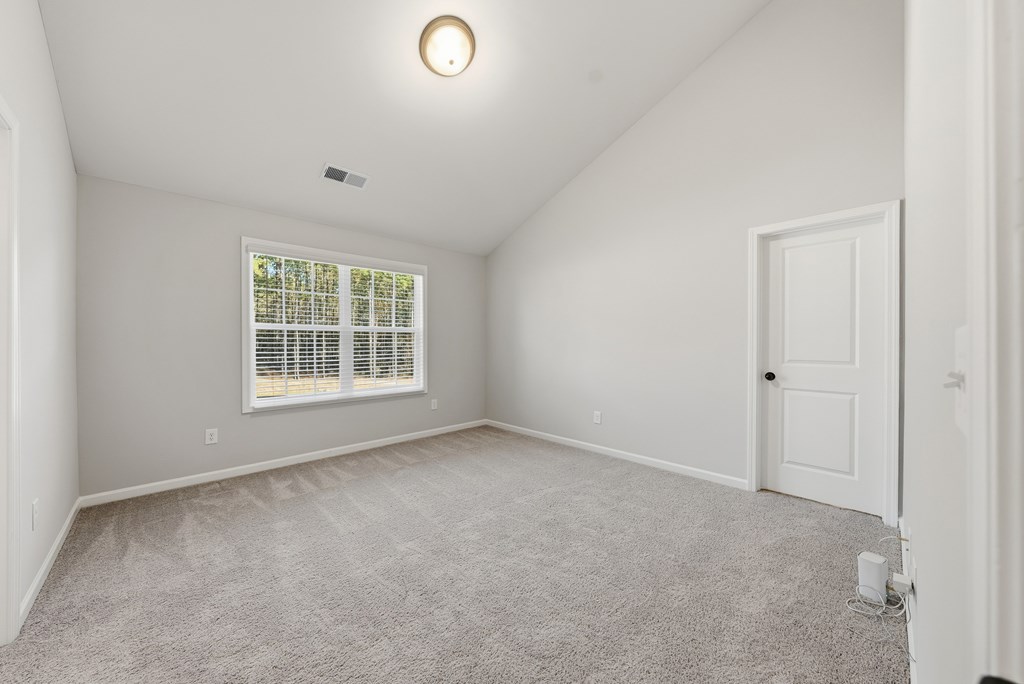 274 James Creek Road Fortson, GA 31808 - Photo 40 of 59 an empty room with windows