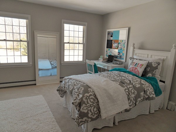 3 Clarks Hill Drive Sutton, MA 01590 - Photo 25 of 30 a bed sitting in a bedroom next to a window