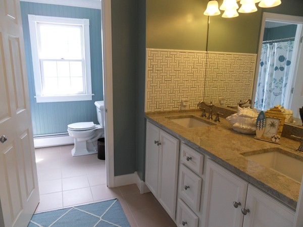 3 Clarks Hill Drive Sutton, MA 01590 - Photo 28 of 30 a bathroom with a granite countertop sink a toilet and a shower
