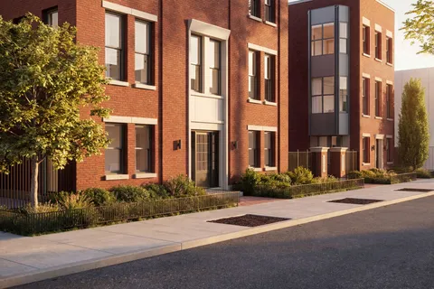 a view of a building along a street