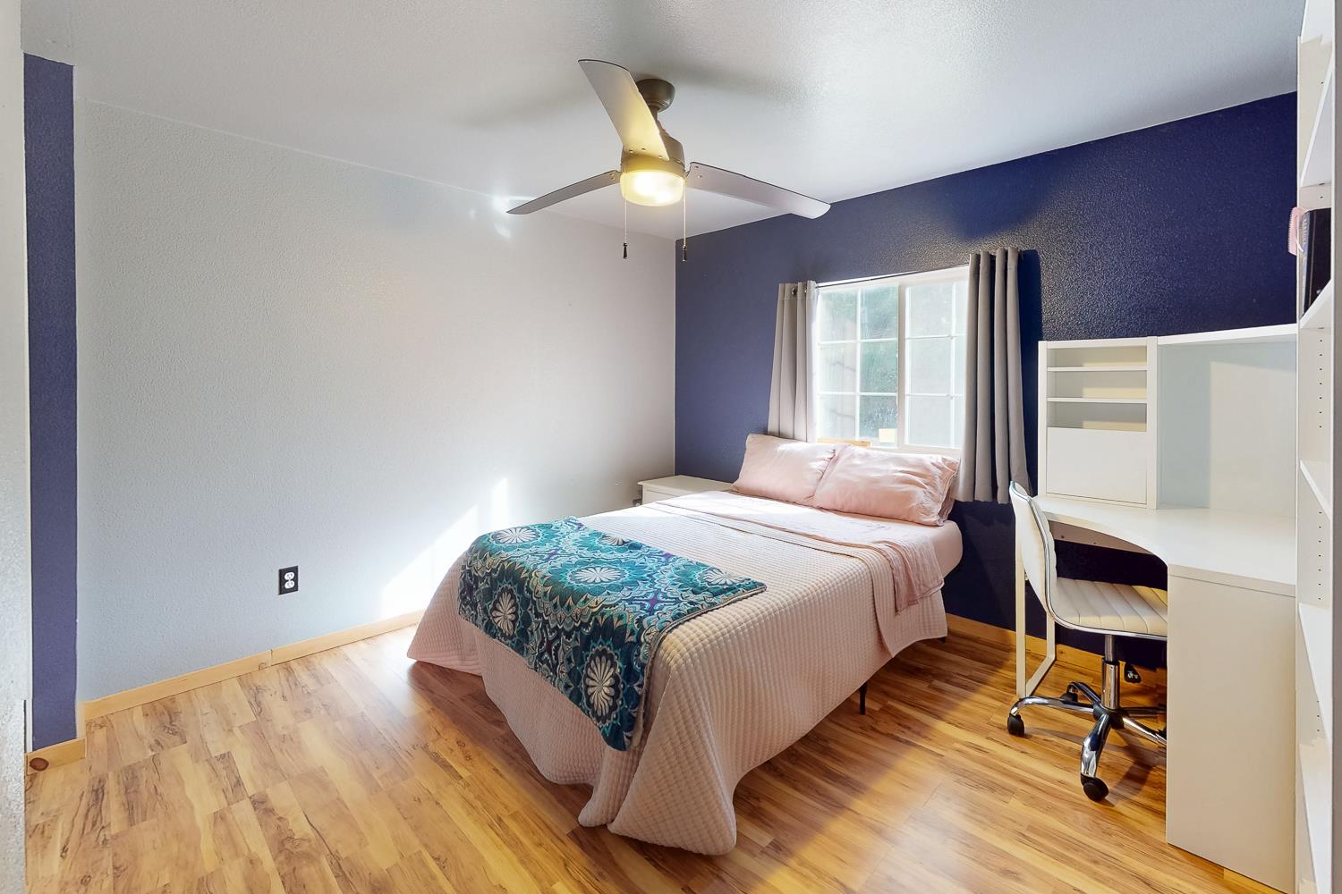 10146 Frenchtown Dobbins Road Dobbins, CA 95935 - Photo 13 of 38 a bedroom with a bed and a chandelier
