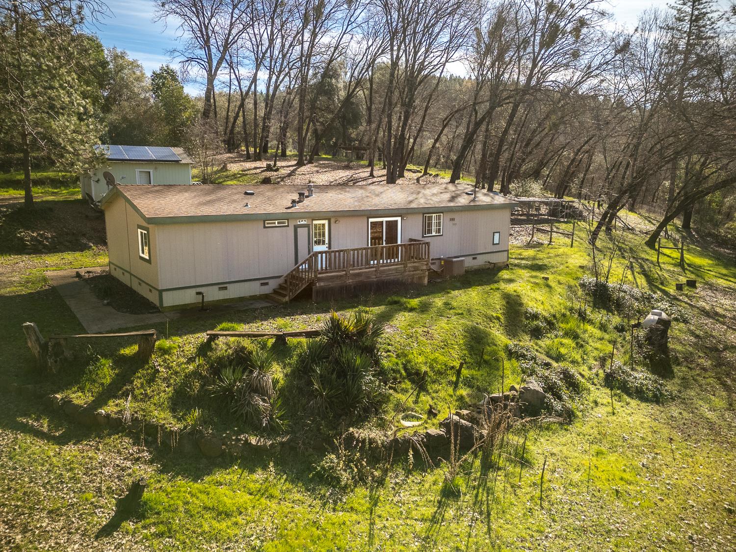 10146 Frenchtown Dobbins Road Dobbins, CA 95935 - Photo 21 of 38 a view of a house with pool and sitting area