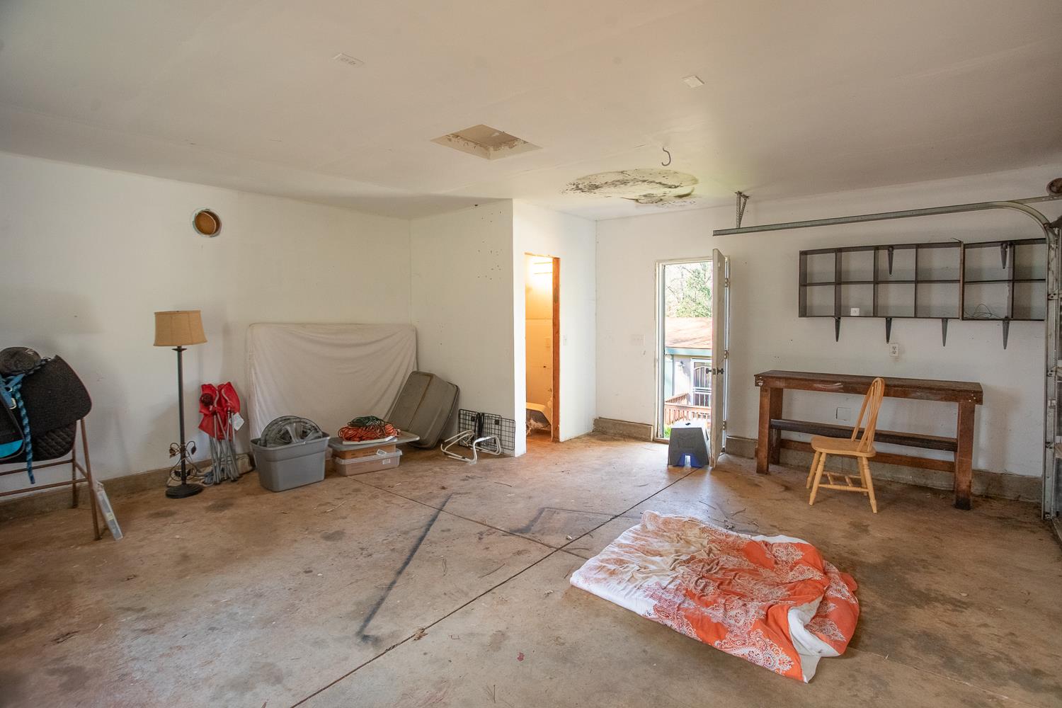 10146 Frenchtown Dobbins Road Dobbins, CA 95935 - Photo 23 of 38 a living room with furniture a dining table and chairs