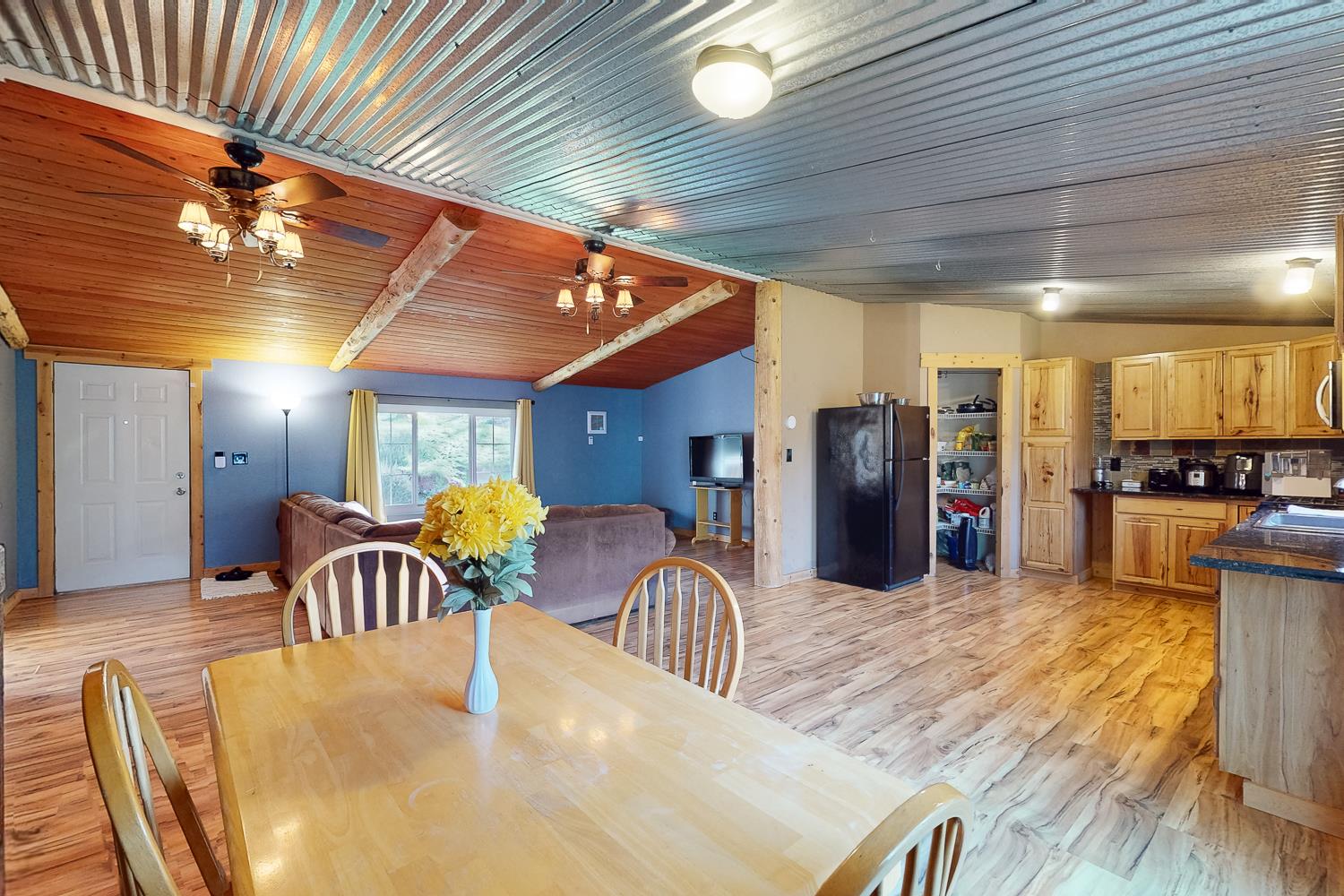 10146 Frenchtown Dobbins Road Dobbins, CA 95935 - Photo 7 of 38 a dining room with furniture and chandelier