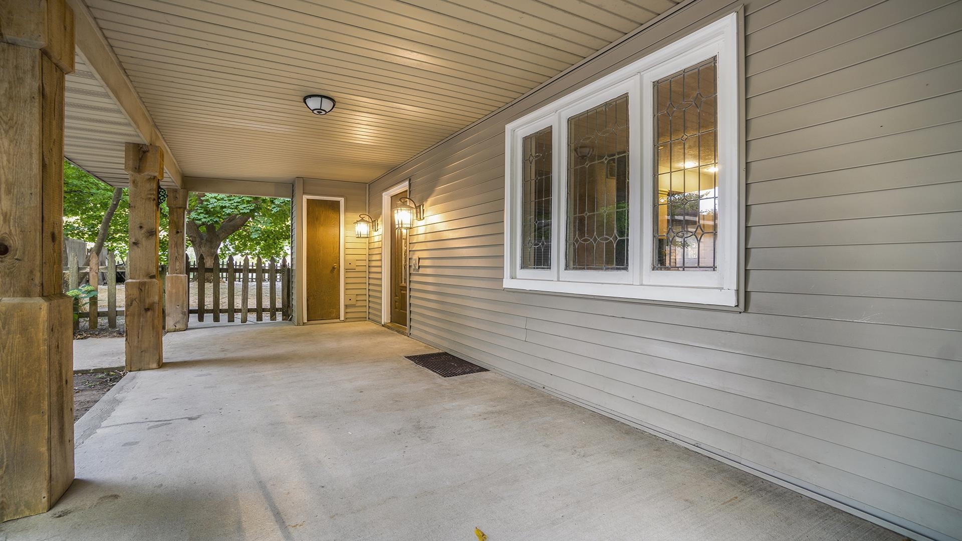 11501 Love Road Roscoe, IL 61073 - Photo 11 of 49 a view of a porch with furniture