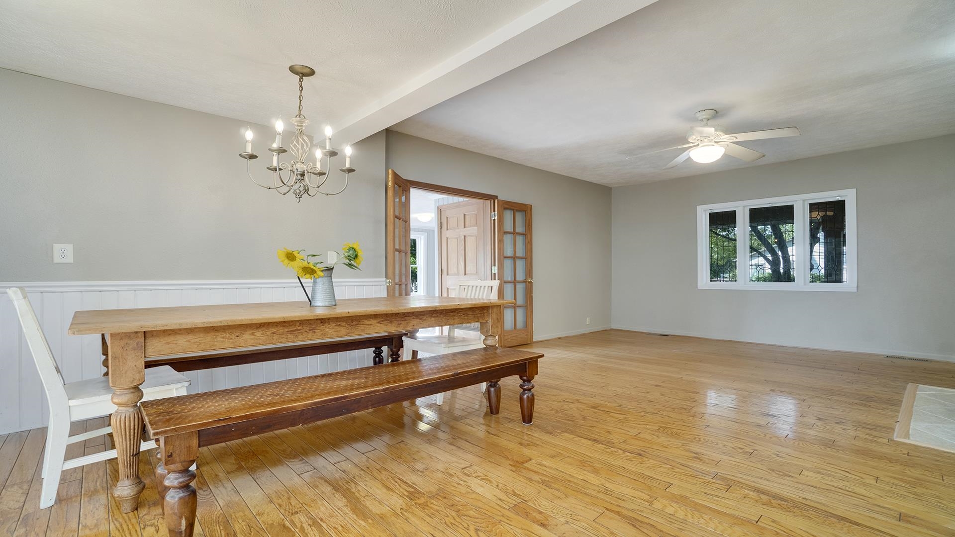 11501 Love Road Roscoe, IL 61073 - Photo 16 of 49 a view of room with wooden floor and ceiling fan