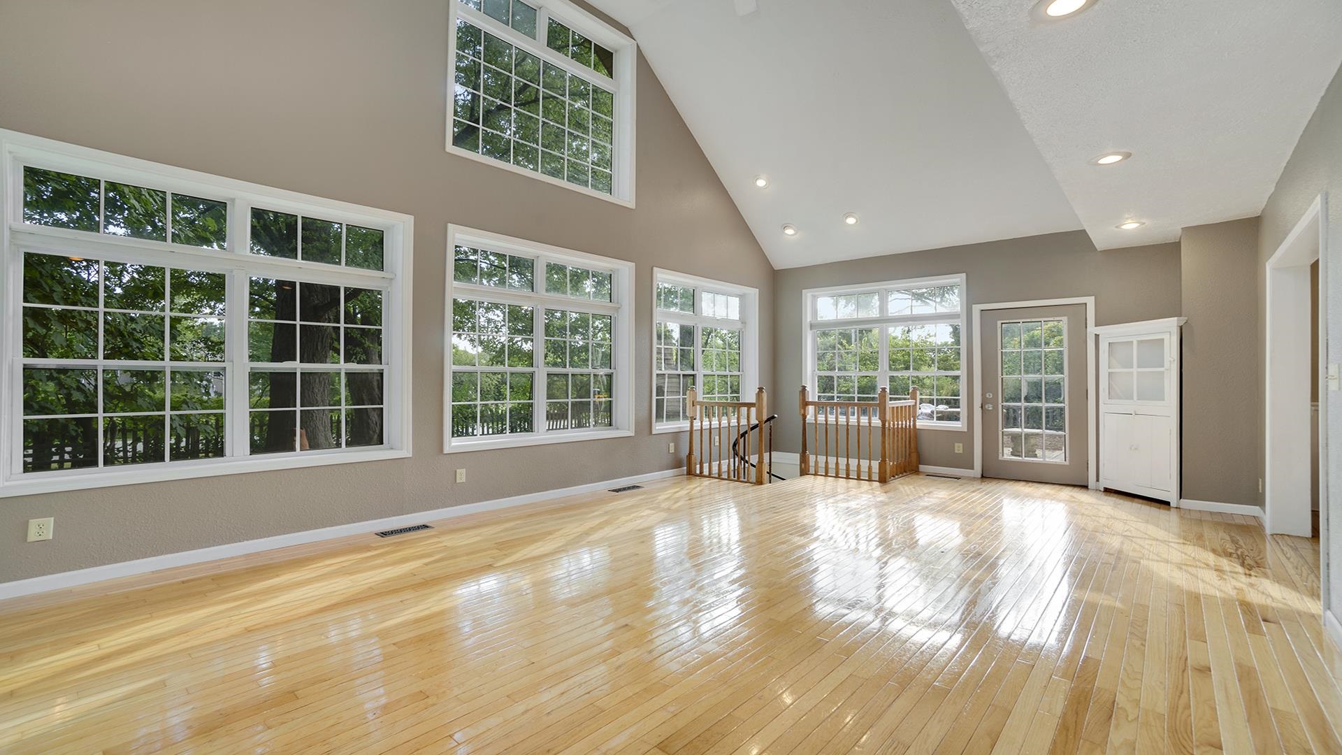 11501 Love Road Roscoe, IL 61073 - Photo 22 of 49 a view of an empty room with wooden floor and a window