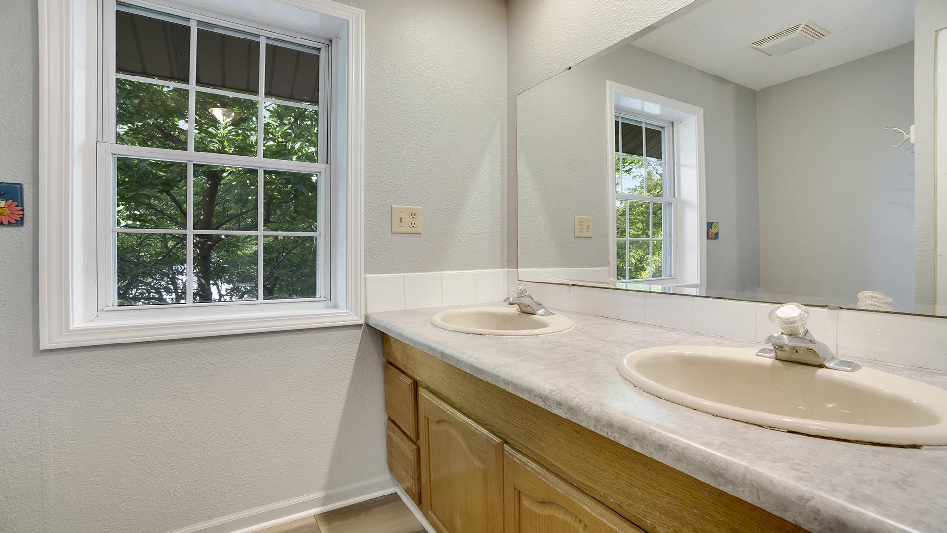 11501 Love Road Roscoe, IL 61073 - Photo 33 of 49 a bathroom with a sink and a window
