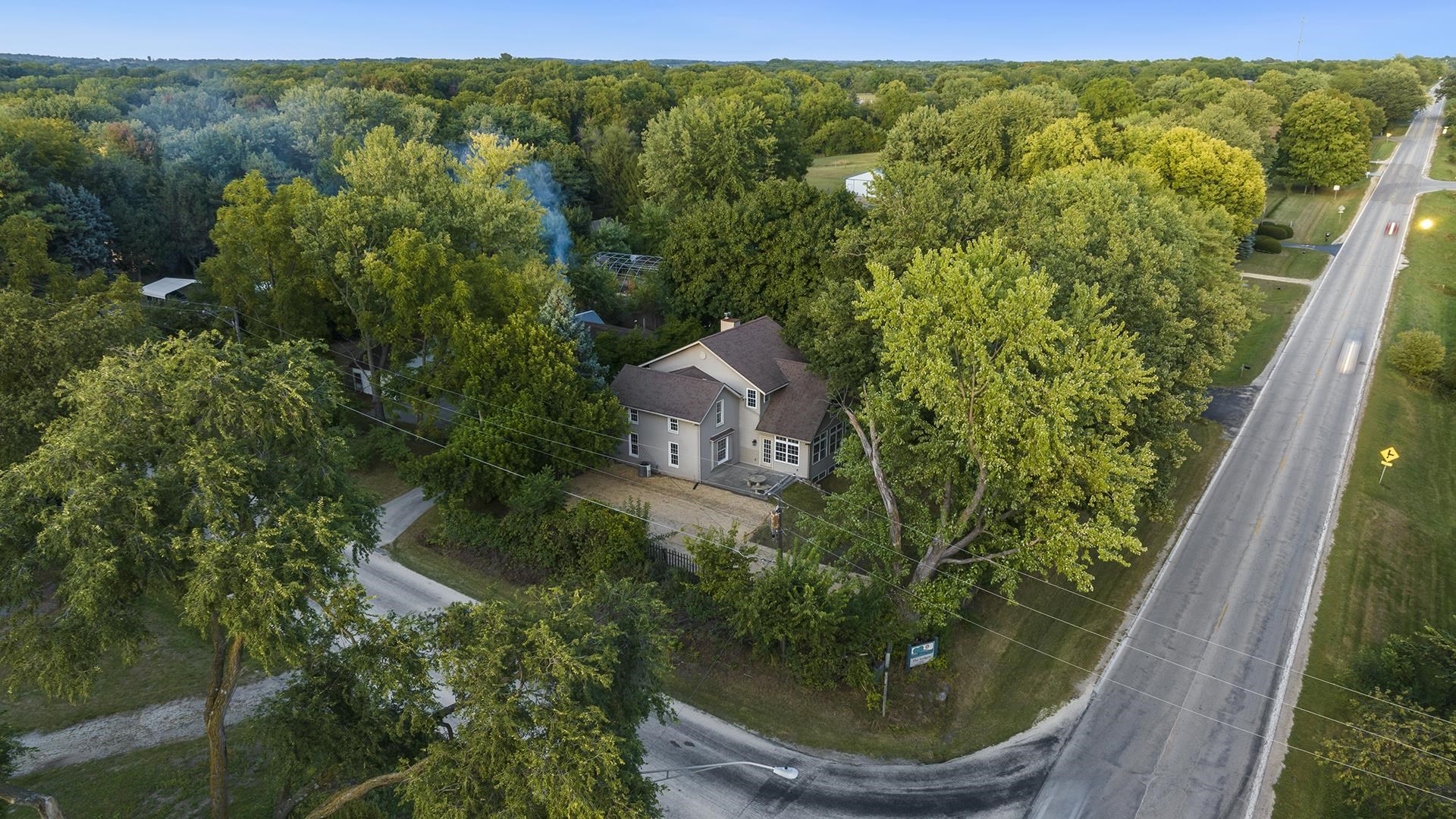 11501 Love Road Roscoe, IL 61073 - Photo 49 of 49 an aerial view of a house with a yard