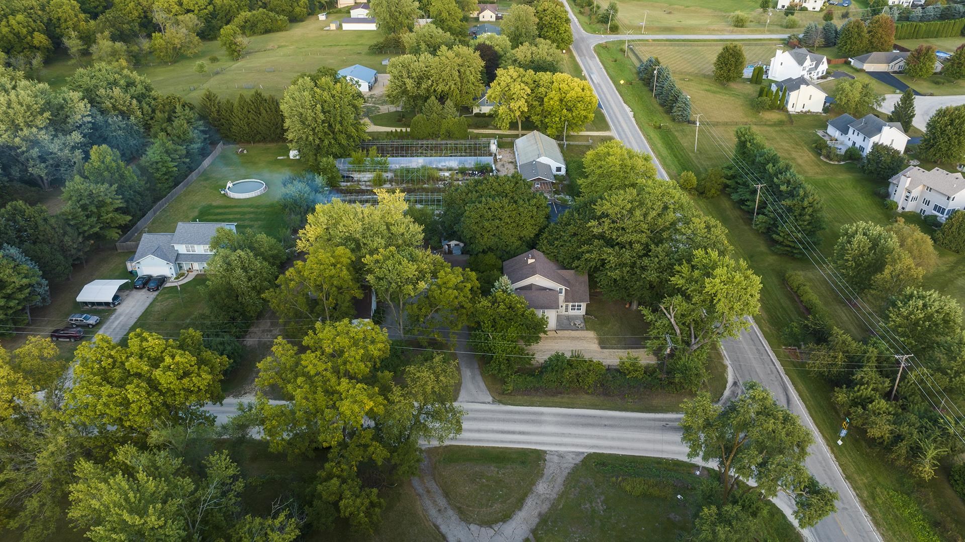 11501 Love Road Roscoe, IL 61073 - Photo 8 of 49 an aerial view of residential house with outdoor space