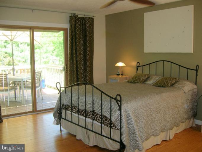 224 Cape St John Road Annapolis, MD 21401 - Photo 10 of 30 Master Bedroom with Private Deck