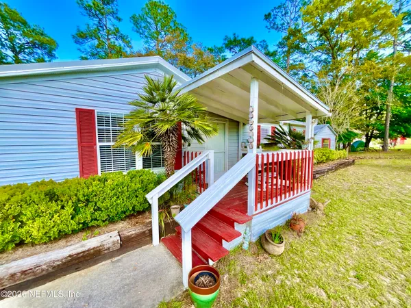 a balcony with wooden floor